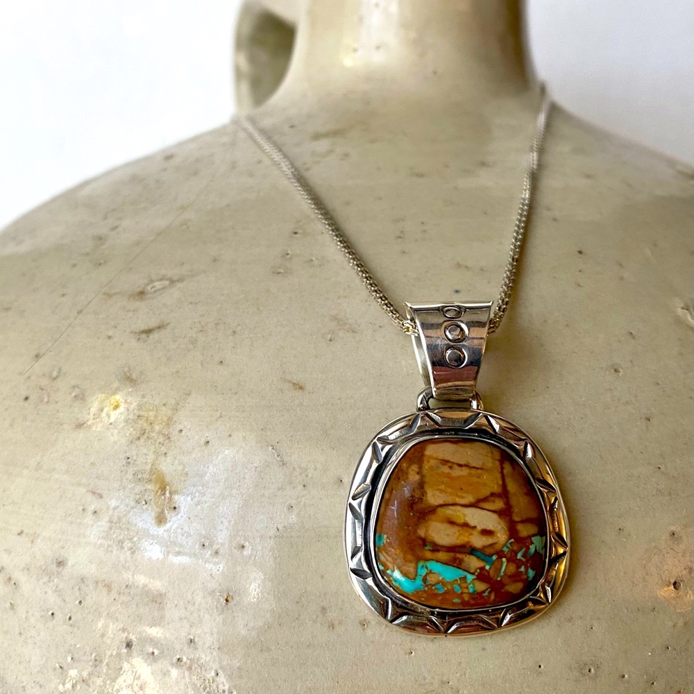 Unique Turquoise Pendant set in .925 Sterling signed TS by the artist.
